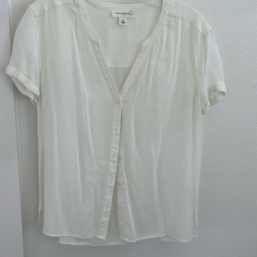 Cream short sleeve button down V neck blouse